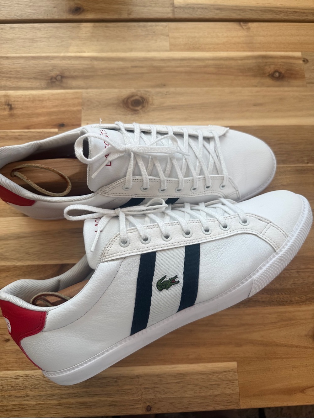 Lacoste White Leather Sneakers with Navy Stripes and Red Heel